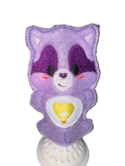 Raccoon care finger puppet