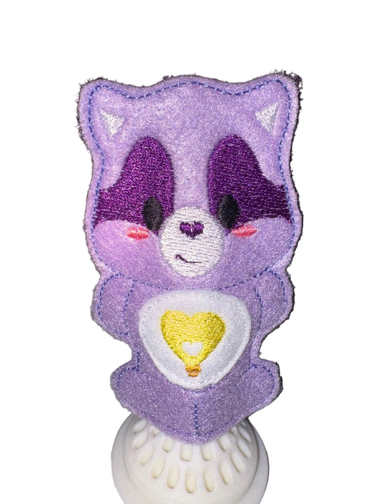 Raccoon care finger puppet