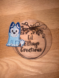 Small blue dog finger puppet